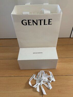 Gentle Monster empty shopping bag and sunglasses box with ribbon